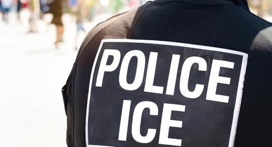 ICE officer from the back | Mathur Law Offices