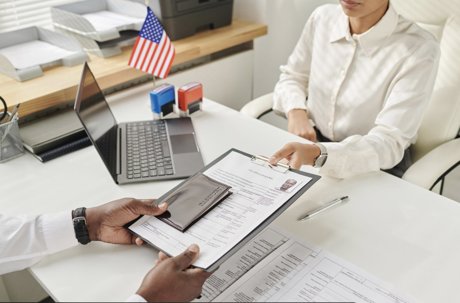 Immigration attorney meeting with a client